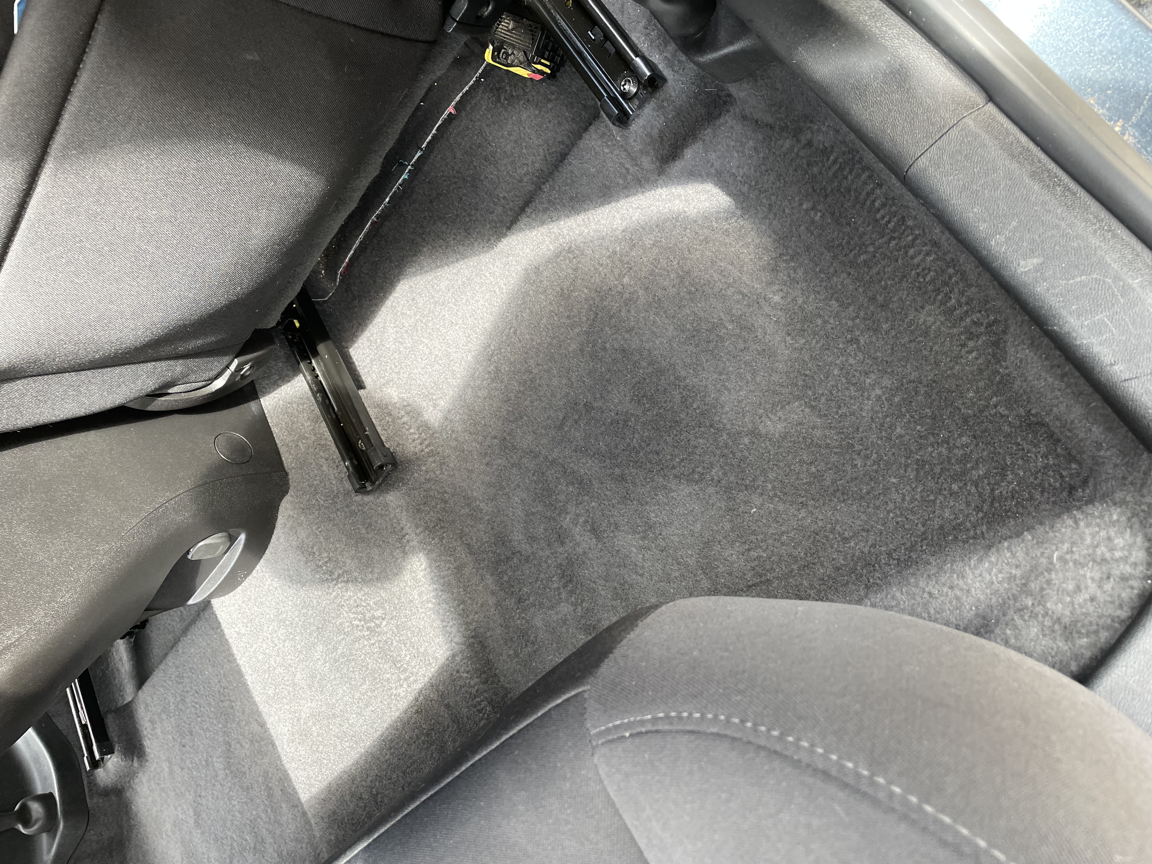 Floor mats & carpet debris after detailing by Miller Detail Co.